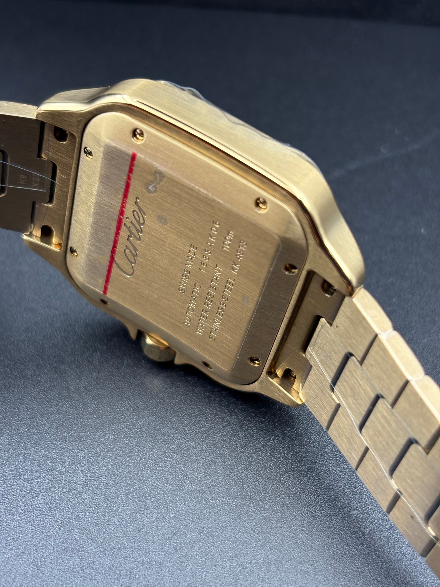 SANT0S DE CARTIER WATCH LARGE MODEL, AUTOMATIC, GOLD, INTERCHANGEABLE