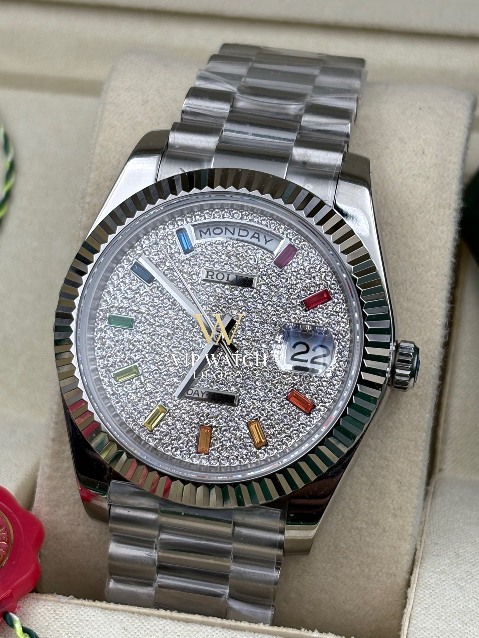 DAY DATE 40MM WATCH FLUTED BEZEL DIAMOND PAVED RAINBOW SAPPHIRE DIAL