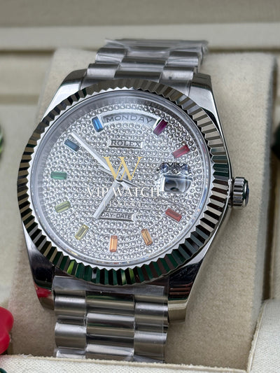 DAY DATE 40MM WATCH FLUTED BEZEL DIAMOND PAVED RAINBOW SAPPHIRE DIAL
