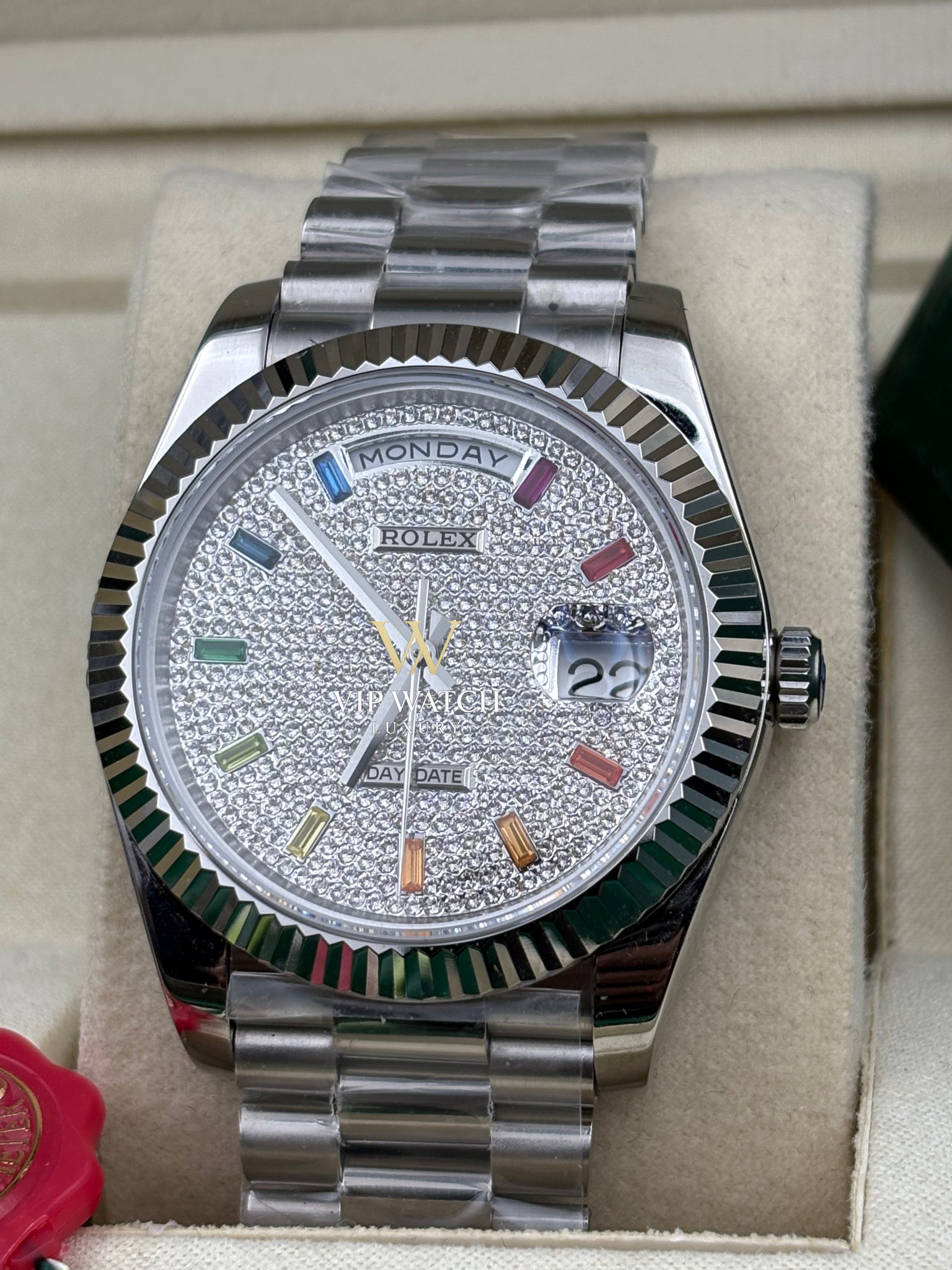 DAY DATE 40MM WATCH FLUTED BEZEL DIAMOND PAVED RAINBOW SAPPHIRE DIAL
