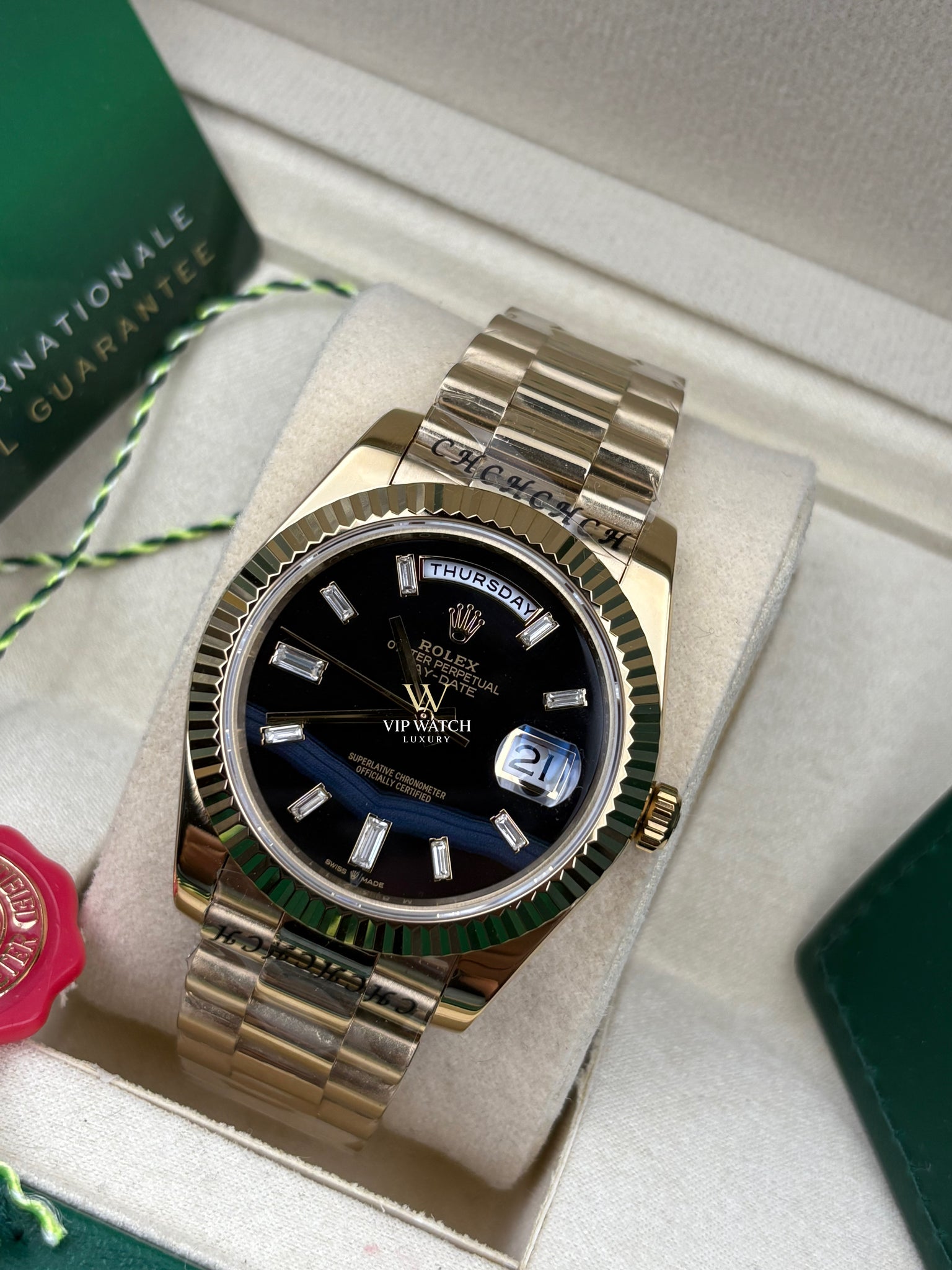 Rolex Day-Date Yellow Gold Black Baguette Dial President