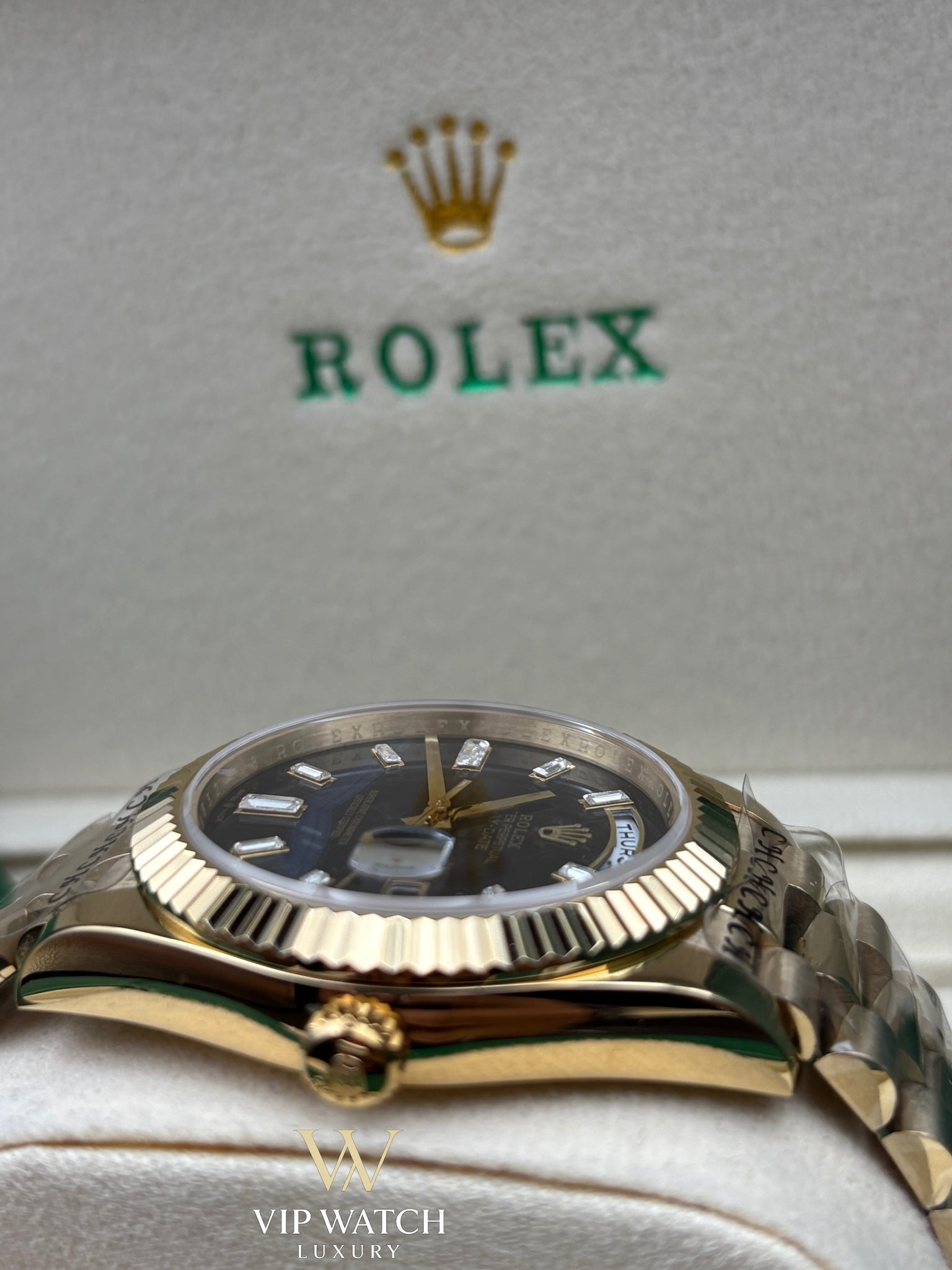 Rolex Day-Date Yellow Gold Black Baguette Dial President